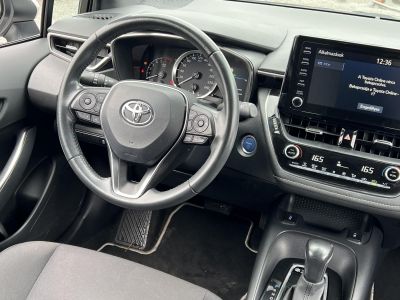 TOYOTA COROLLA 1.8 Hybrid Comfort Business e-CVT 80e km. tempomat. navigáció. ülésfűtés. kamera. digitklíma. 2 gyári kulcs!